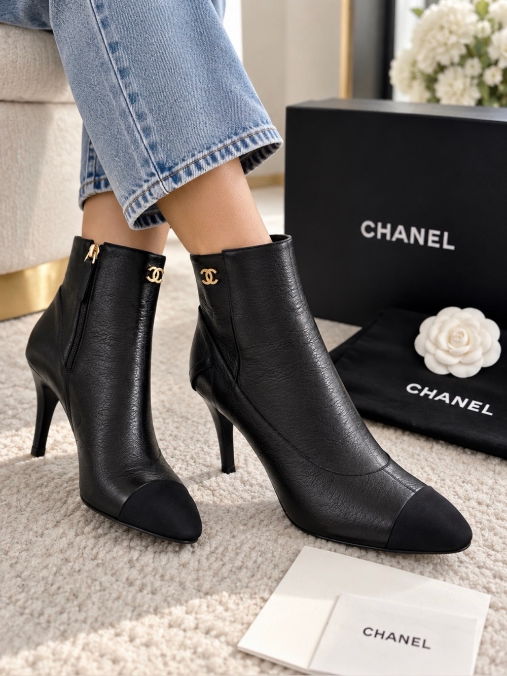 CHANEL Black Leather Ankle Booties with Black Cap Toe and Gold CC